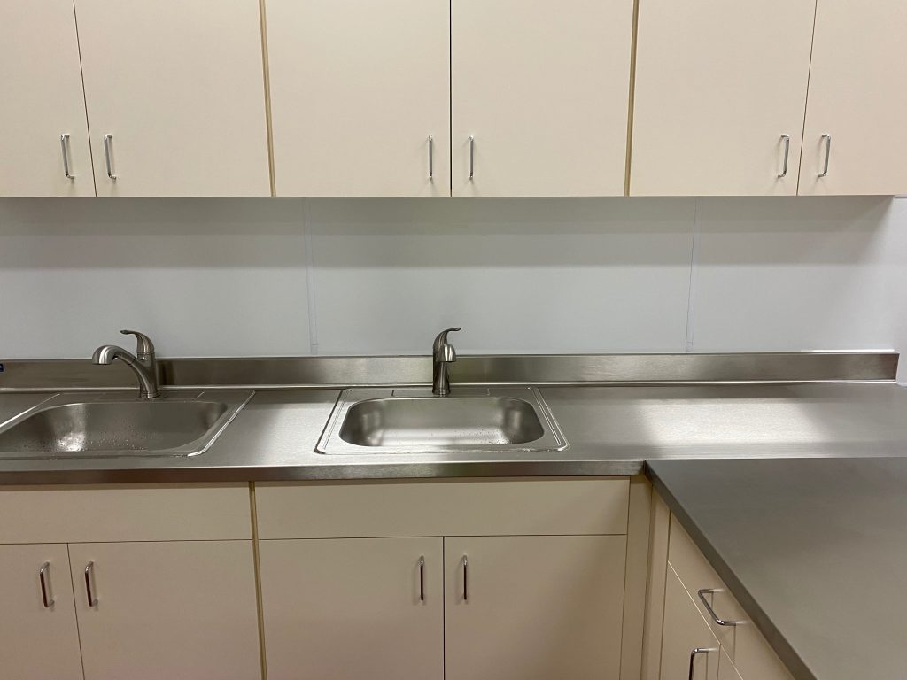 Custom Industrial Build with Utility Piping - Kitchen Sink and Cabinets