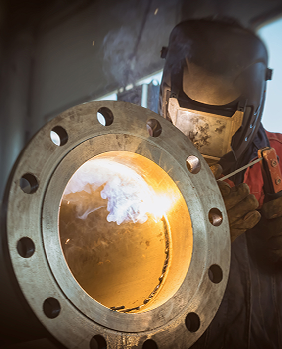 Industrial Piping Services Welder At Work