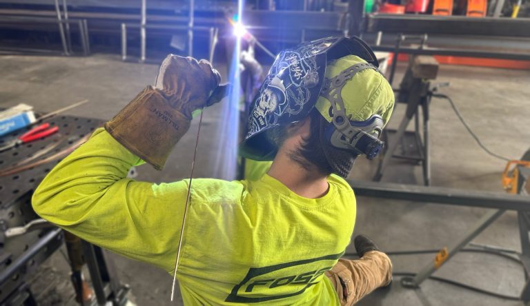 welding handrail for access platform and stairway to mezzanine.